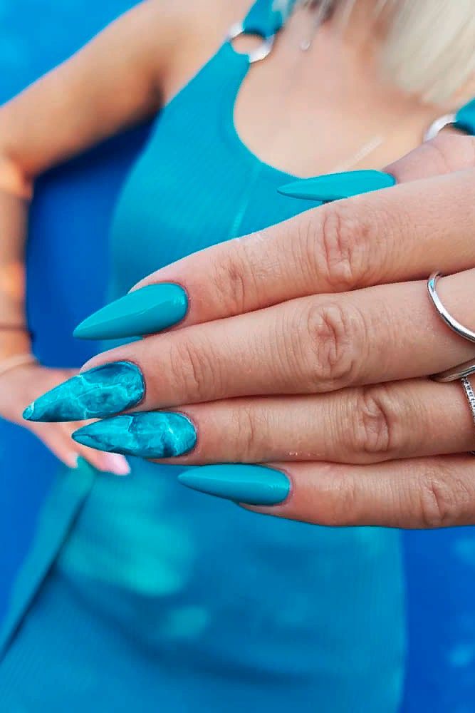 Turquoise Stilettos #stilettonails #turquoisenails