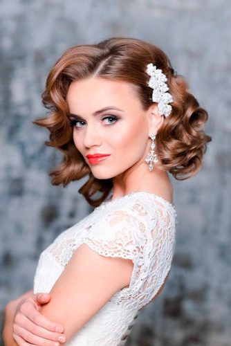 Curly Low Updo Wedding Guest Hairstyle