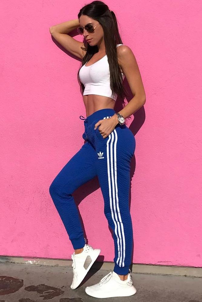 blue adidas pants outfit