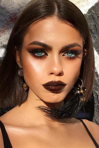 Black And Blue Eyeliners With Brown Lipgloss Makeup #lipgloss