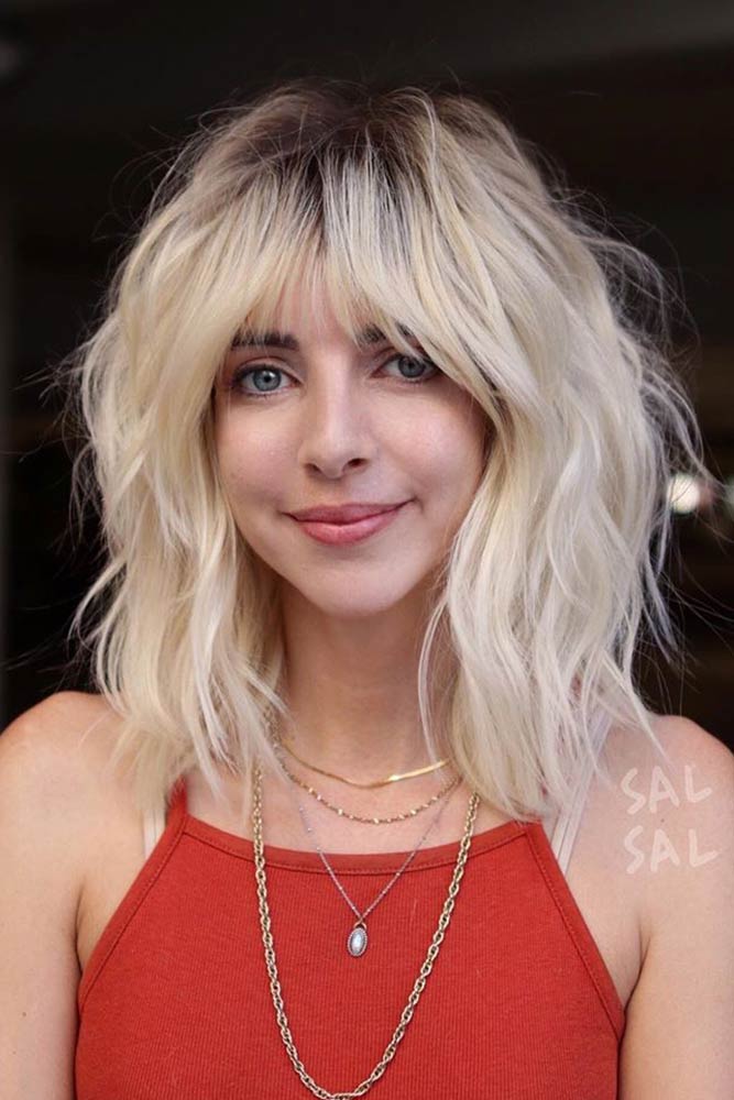 Image of Shaggy blonde bob with long layers