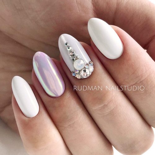 White Shellac Nails Designs With Rhinestones For A Classy And Elegant Look #whitenails #ovalnails #rhinestonesnails #chromenails