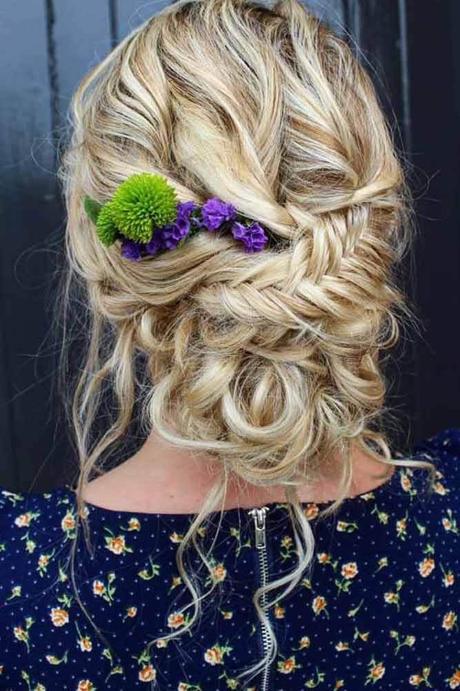 Chignon Hairstyle With A Floral Accessory #floralaccessory #fishtailbraid