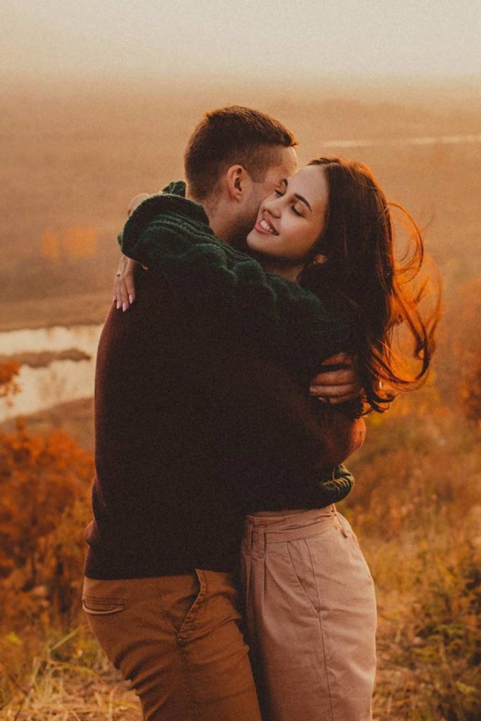 Youre the best thing that ever happened to me. a young couple kissing while  out on a date Stock Photo - Alamy