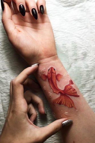 Red Fish Wrist Tattoo Idea #fishtattoo