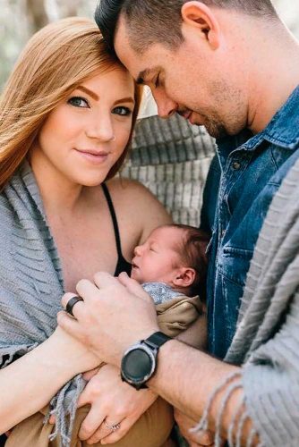 Happy Parents Holding Their Baby #babyphoyoshoot #happiness