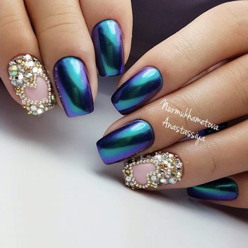 Bold Combination Of Chrome Nails And Crystal Accents #bluenails #chromenails #rhinestonesnails