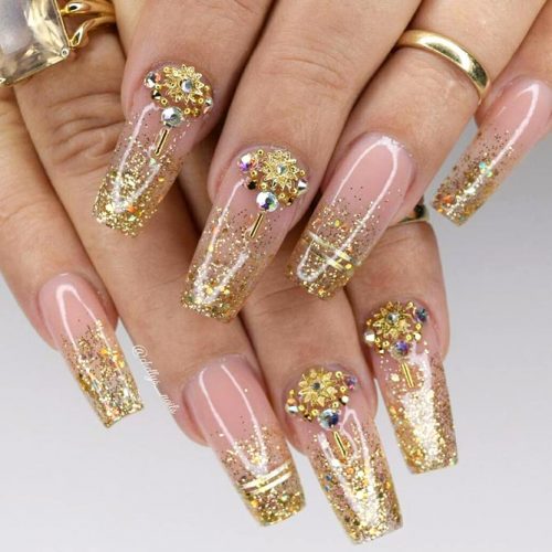 Gold Glitter Fade To Complete Your Trendy Look #glitternails #goldnails #rhinestonesnails #ombrenails #glitterombre