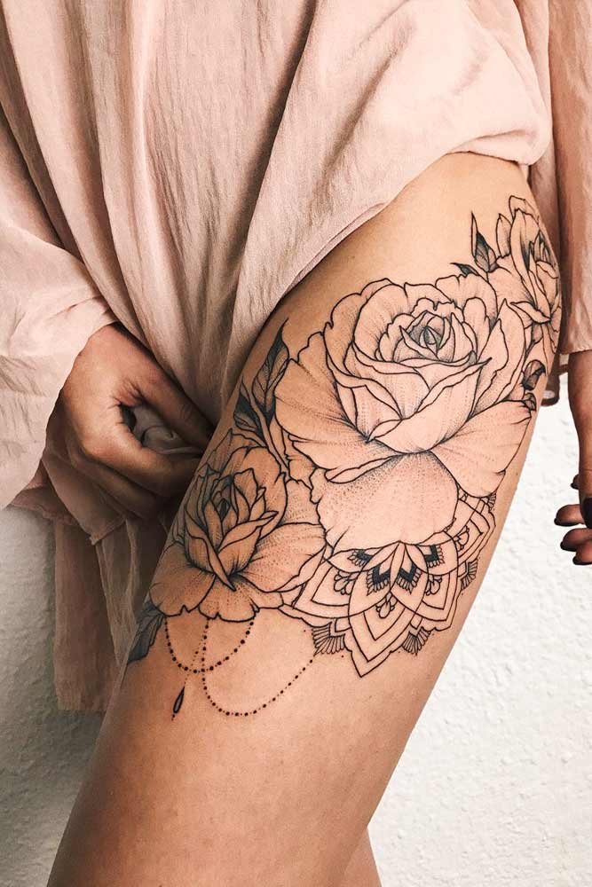 roses tattoos on thigh