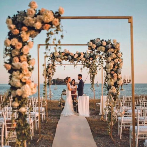 An Industrial Arch With Floral Accents #modernweddingarchway #flowersweddingarch