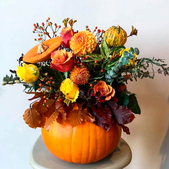 Fall Pumpkin Center Pieces #fallflowers #pumpkincenterpieces #fallcenterpieces 