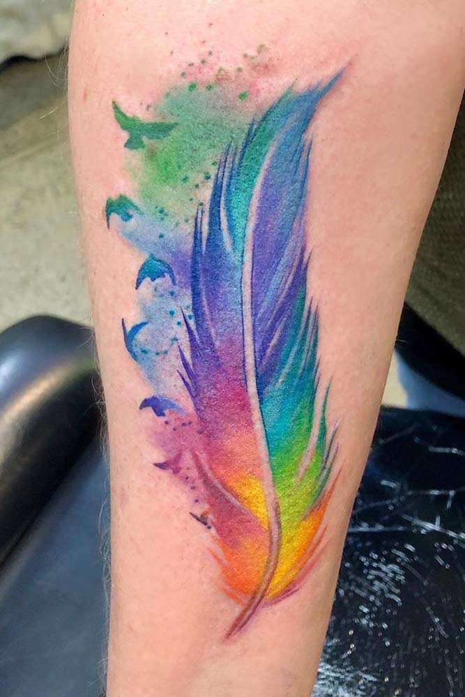 abstract watercolor feather tattoo