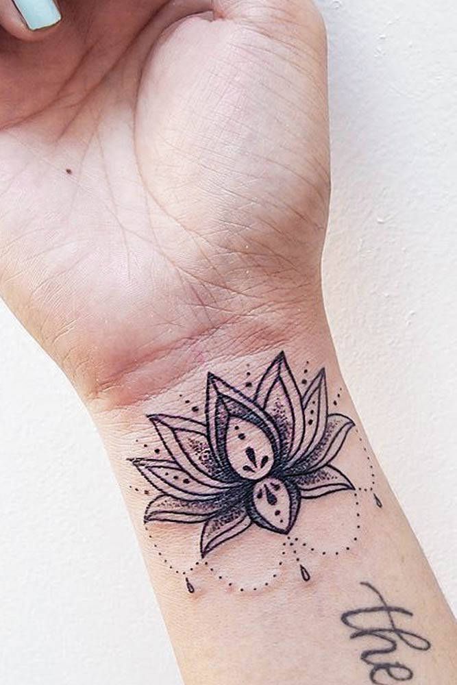 Small Lotus Flower Tattoo Design #lotusflowertattoo #lotustattoo #wristtattoo
