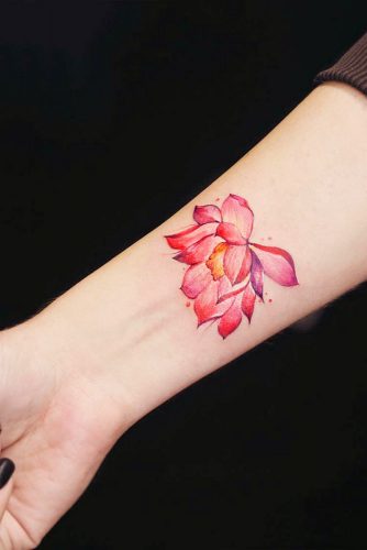 Colorful Watercolor Wrist Lotus Tattoo #watercolortattoo #lotusflowertattoo #lotustattoo
