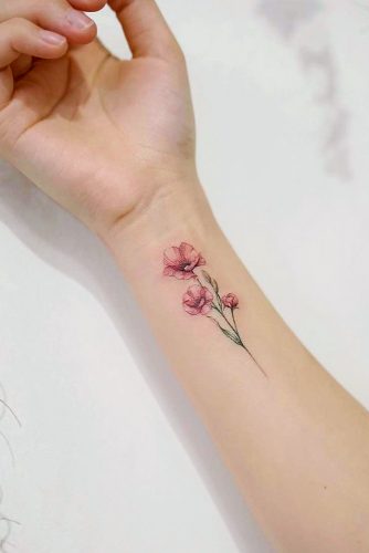 Watercolor Poppy Flower Design For Wrist #wristtattoo #poppyflowertattoo