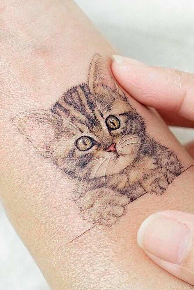 Realistic Cat Tattoo On Wrist #wristtattoo