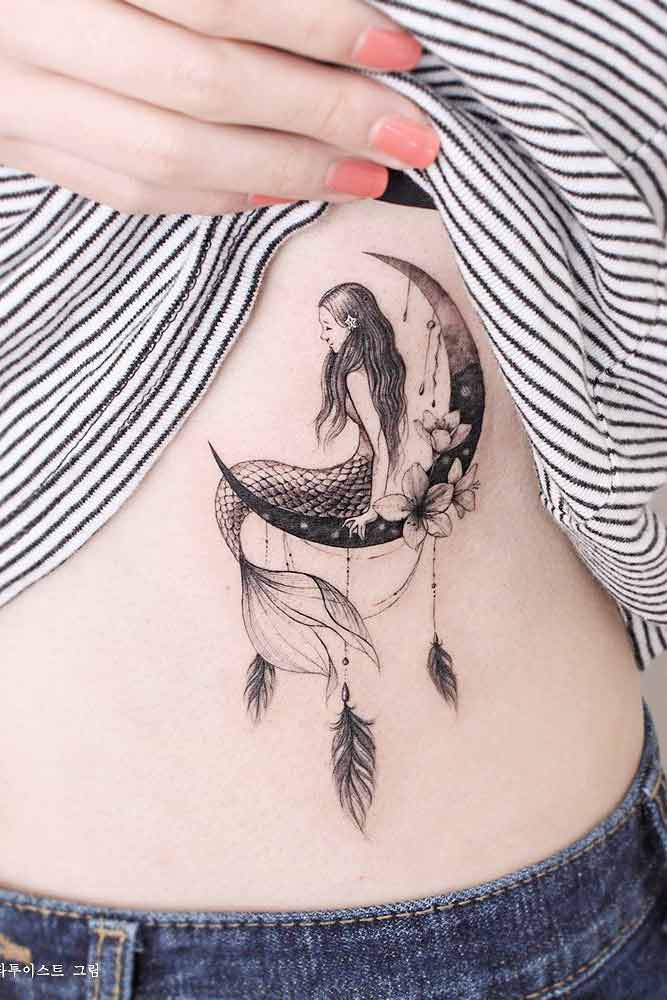 Black Tattoo With Feather And Moon Design #moontattoo