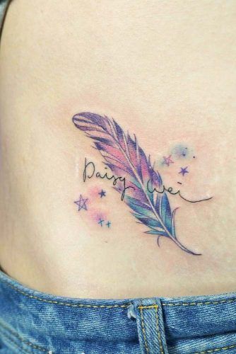 Galaxy Colored Feather Tattoo With Lettering #galaxytattoo #letteringtattoo