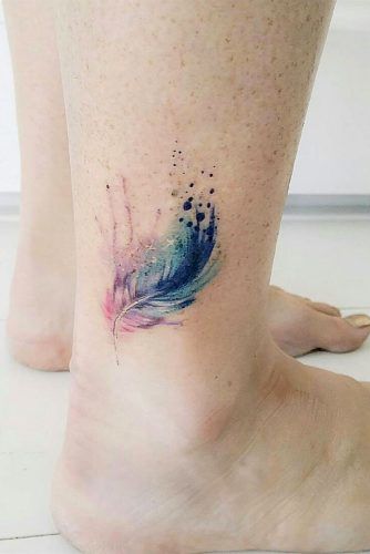 Small Watercolor Feather Tattoo On Leg #watercolortattoo