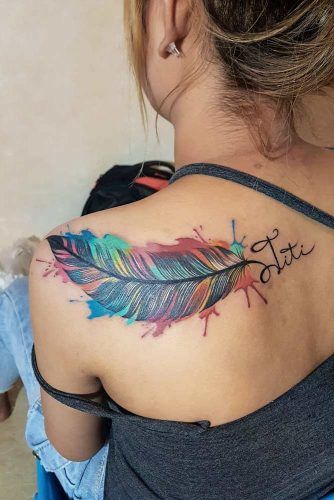 abstract watercolor feather tattoo