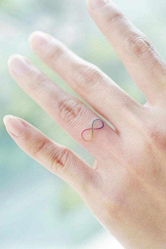 Tattoo 9 An infinity  eternity symbol  heart on my wedding ring finger  02042014  Wedding band tattoo Finger tattoos Ring finger tattoos