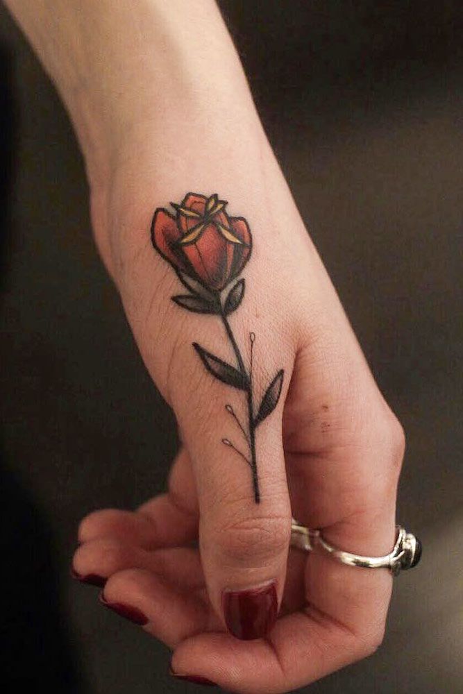 Fine line rose tattoo on the pinky finger