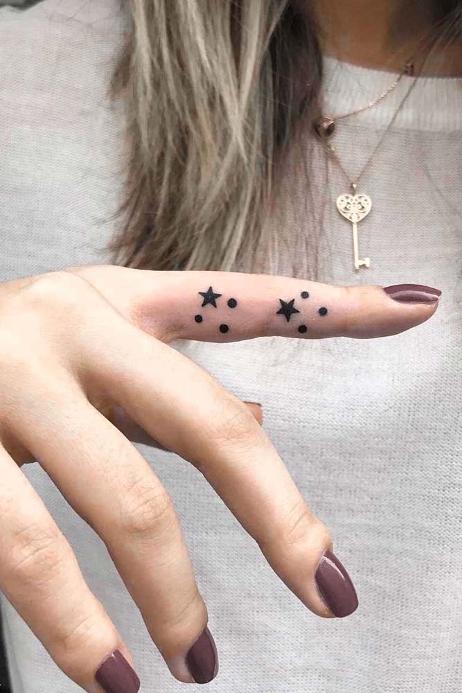 finger tattoos stars dots