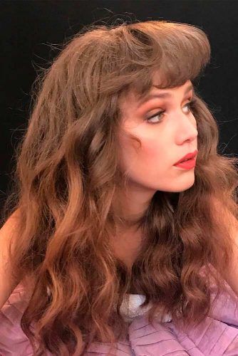 The Sky-High Bangs #wavyhairstyles #banghair #retrohairstyles