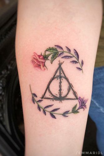  Deathly Hallows Tattoo Design With Flowers #deathlyhallows 