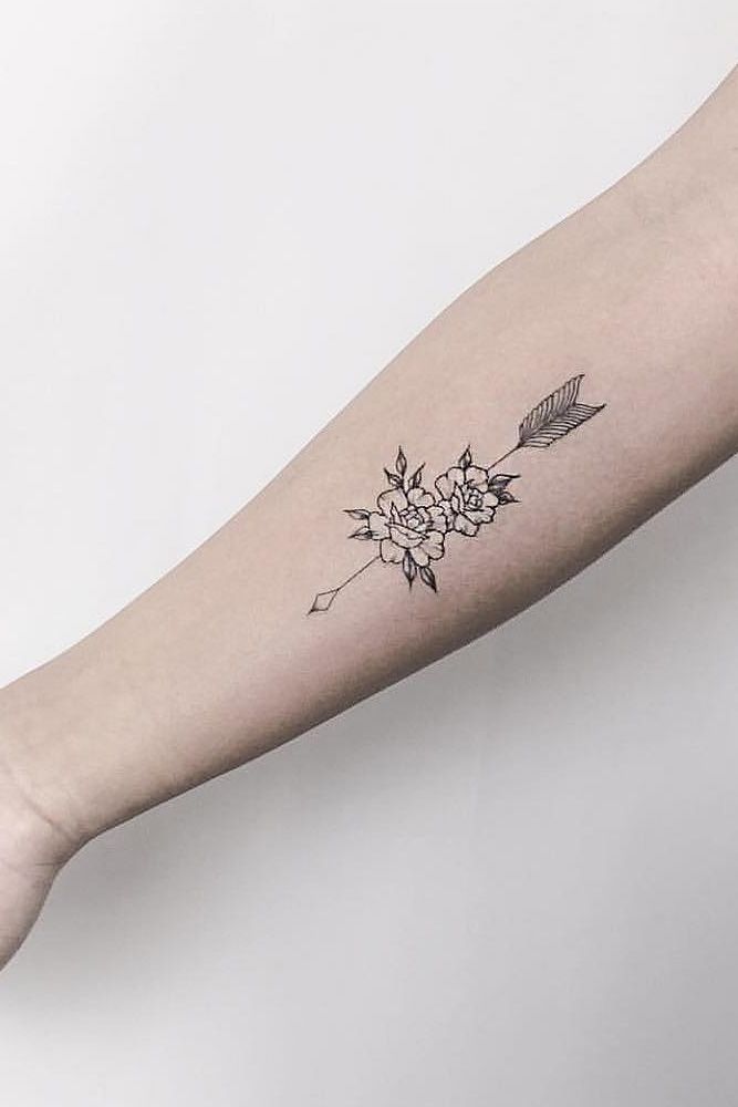 Hand-poked small arrow tattoo on the forearm - Tattoogrid.net