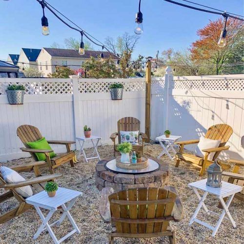 Fire Pit Area With Wood Chairs And String Lights #cozyfirepitarea