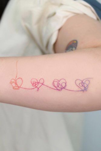 linked hearts tattoo design