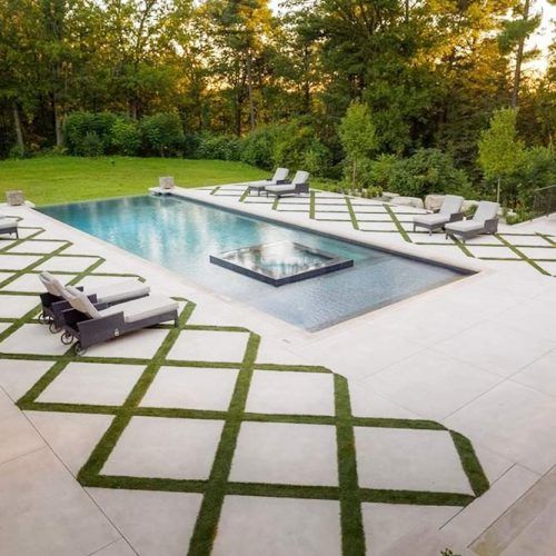 Concrete Pool Deck With Grass Accent #concretedeck