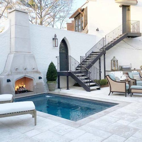 Pool Deck With Fireplace And Rest Space #fireplace #backyarddesign