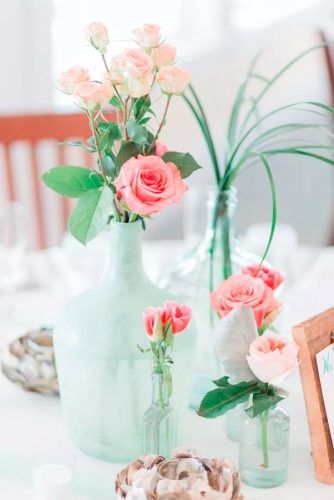 Sea Glass Blue, Ivory, and Coral #wedding #floraldecor