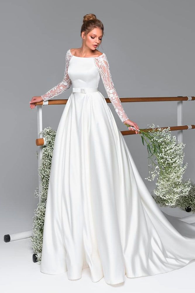 a line wedding gown with sleeves