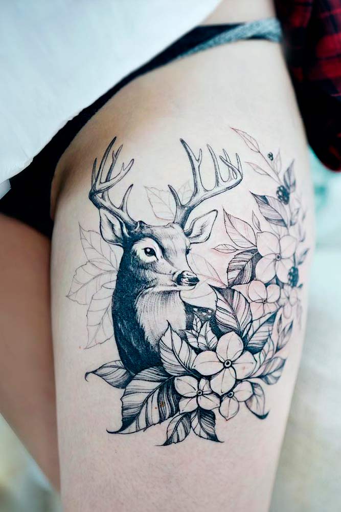 A Black And White Thigh Tattoo With A Deer #deertattoo