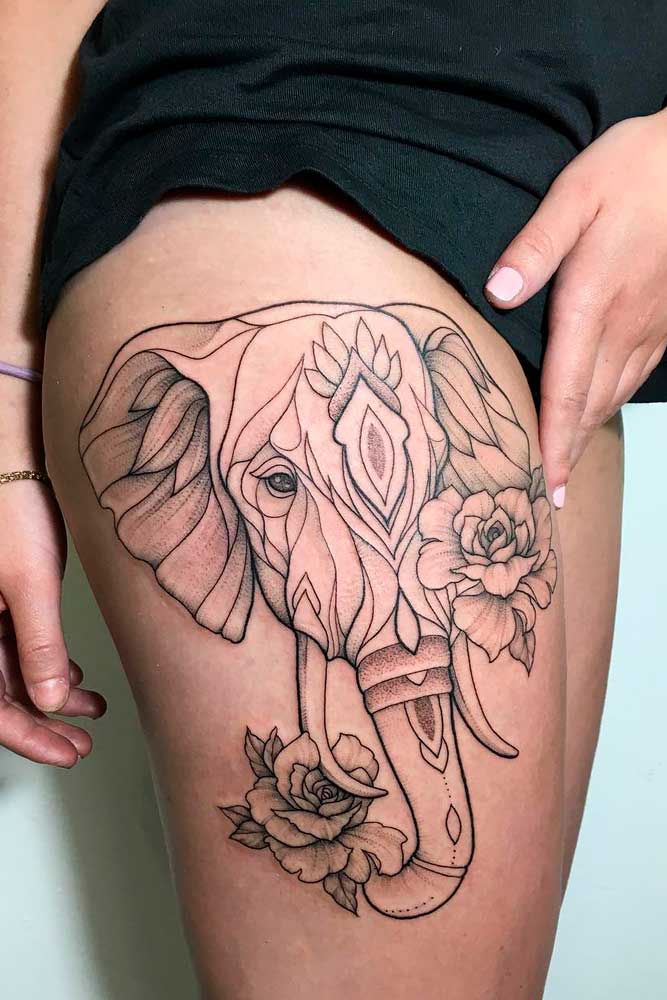 Un tatuaje de elefante de contorno para un muslo