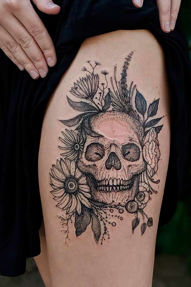 A Black And White Skull Tattoo Idea With Flowers #skulltattoo #floraltattoo