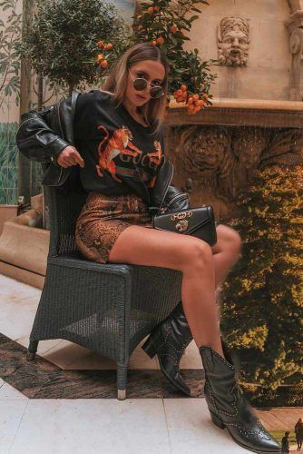Black Cowboy Boots With Animal Printed Mini Skirt And Leather Jacket #casualoutfit #stylishlook