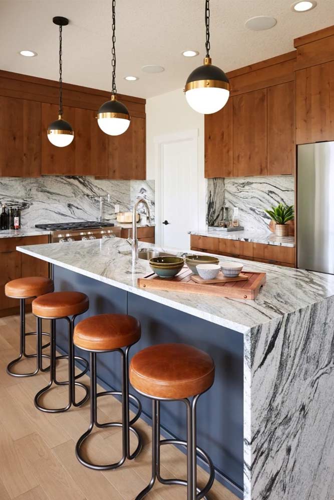 Mid-century Kitchen With Marble Counter Top And Backsplash #marble #wooden