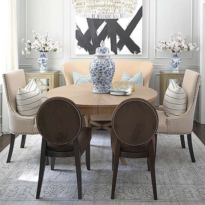 round dining table with mixed chairs