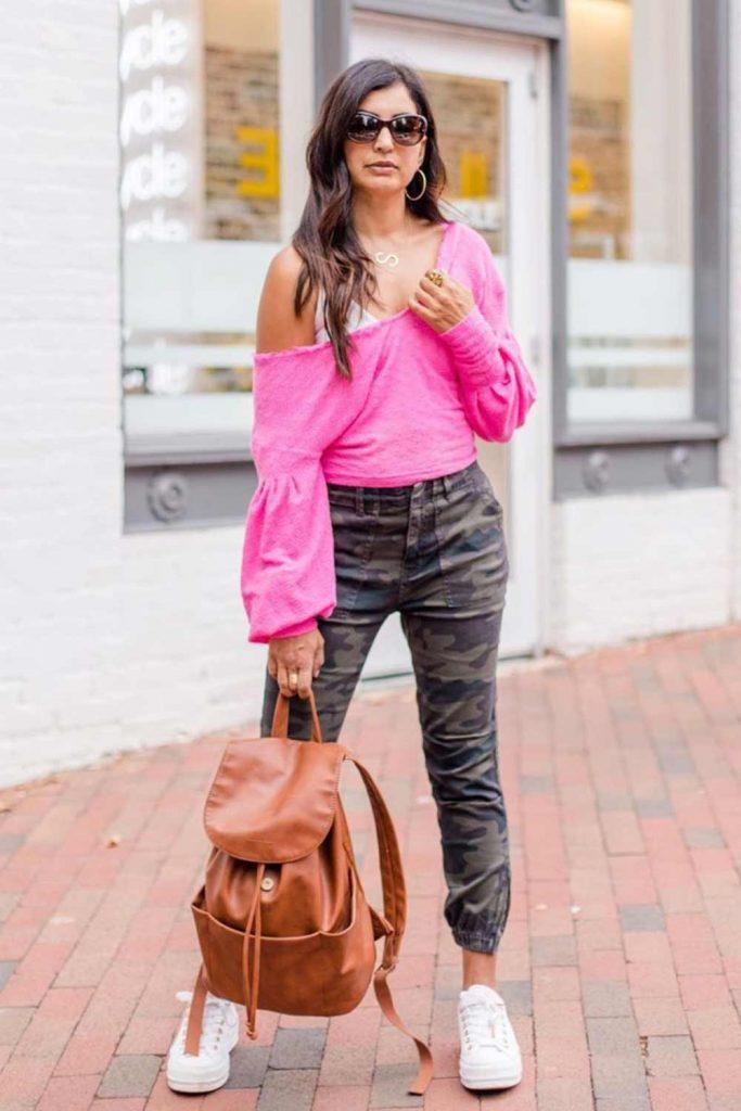 pink shirt camo pants