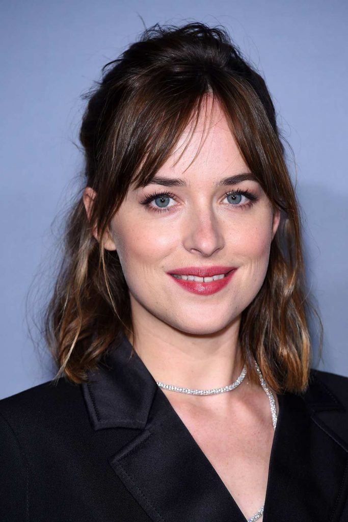 Dakota Johnson with Curtain Bangs