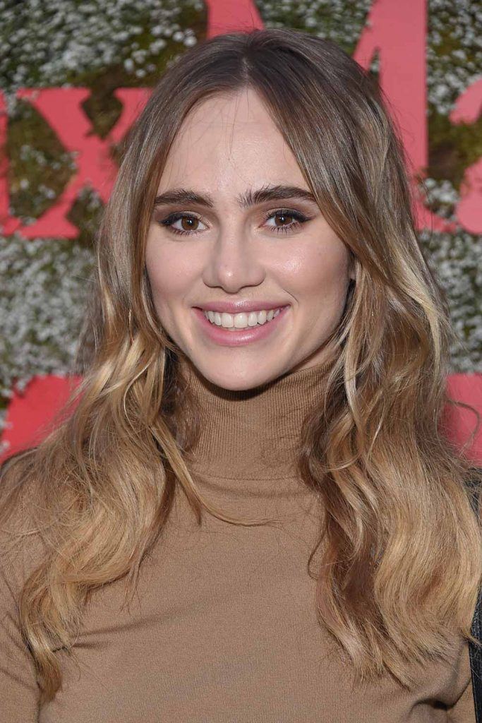 Suki Waterhouse with Curtain Bangs