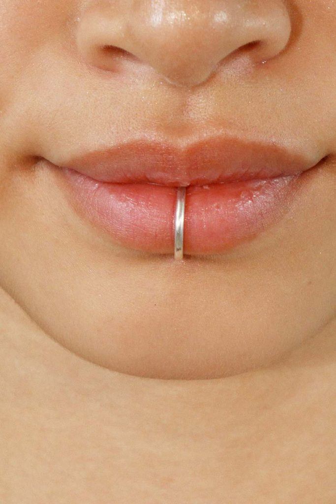 Lip hot sale chin piercing