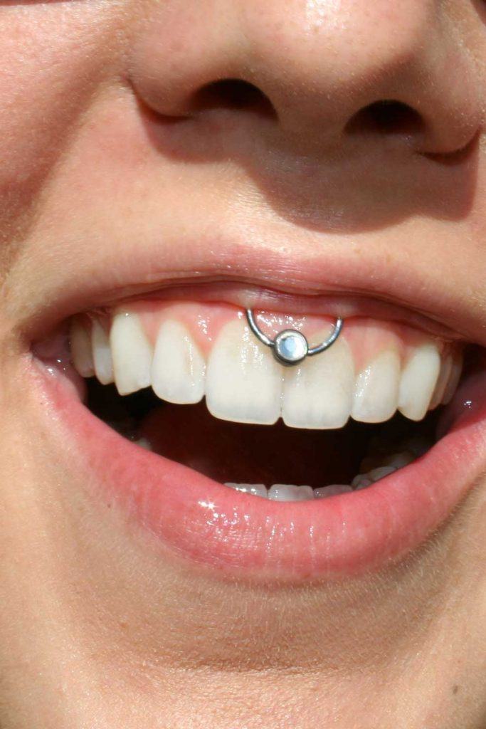 Smiley Piercing Guide To Get A Mouth Piercing Glaminati