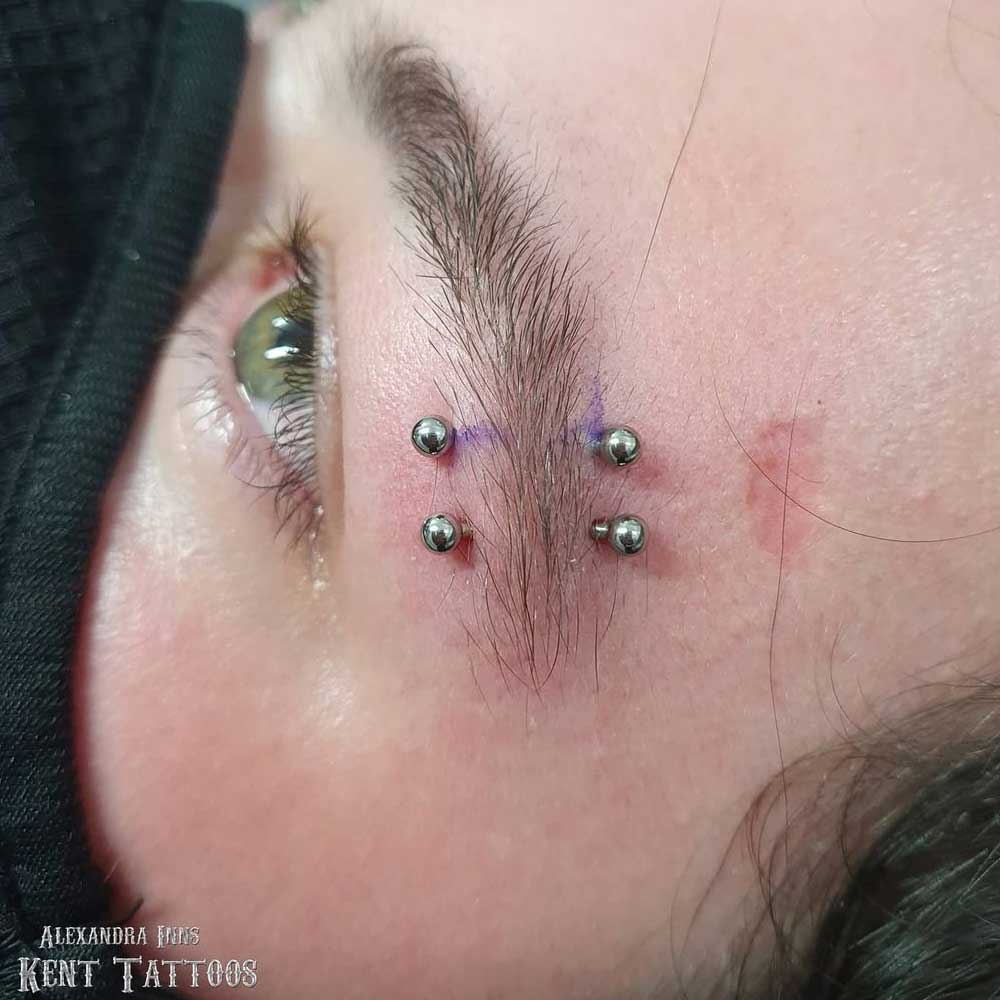 Double Eyebrow Piercing