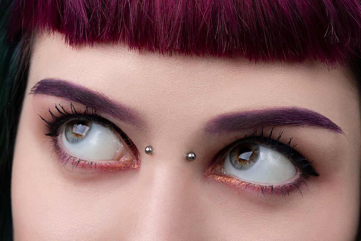 What You Should Know About Bridge Piercing: From Pain Level To Aftercare Tips