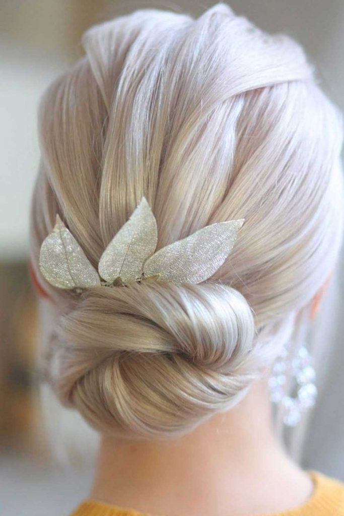 Low Blonde Bun with Leaves Accessory